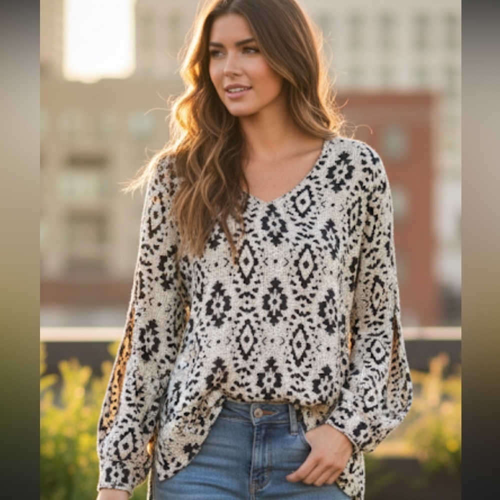 Women's Black and off White Patterned Top with split sleeve size large